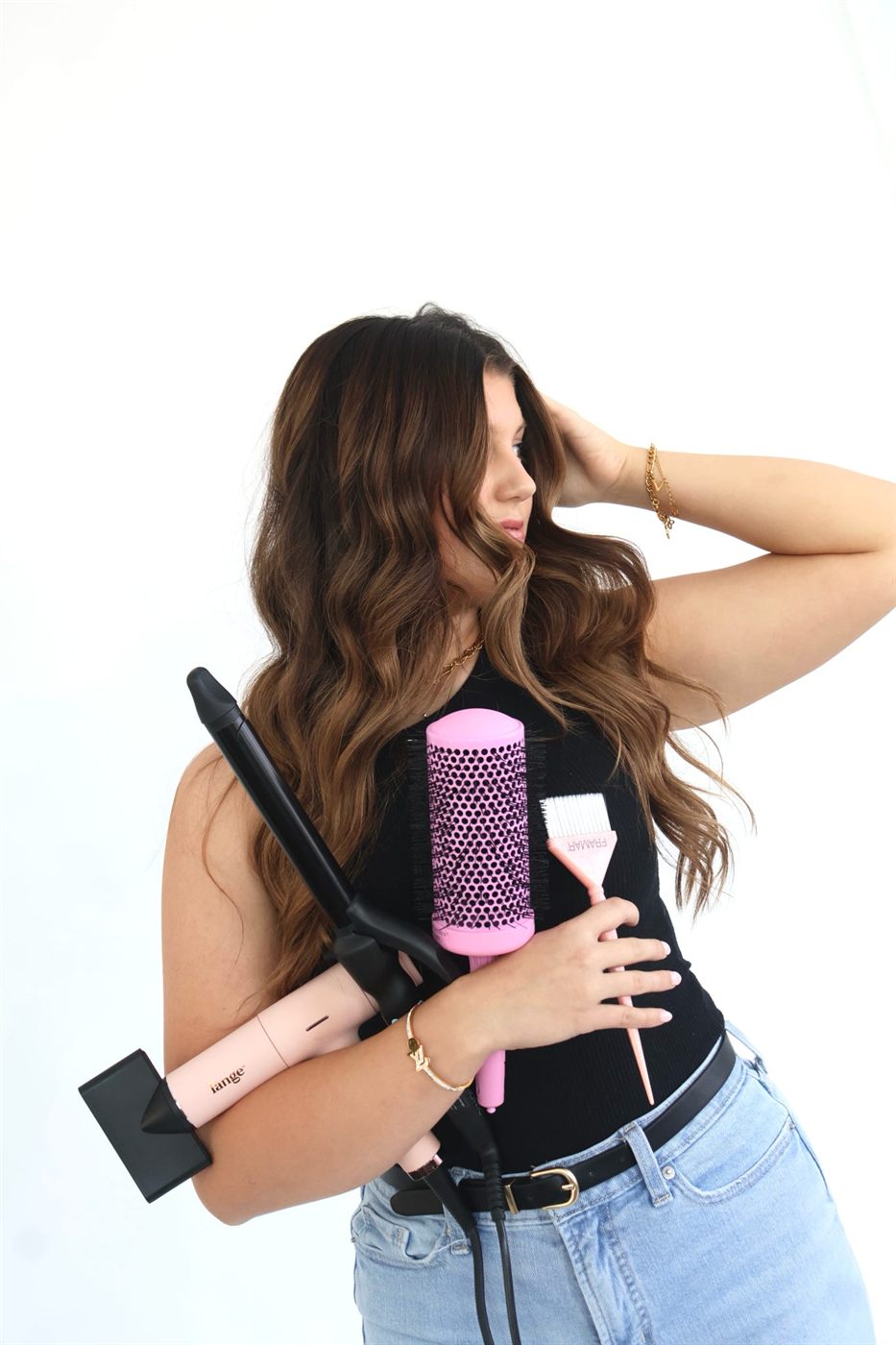 Madison with her blow dryer, round brush and color brush